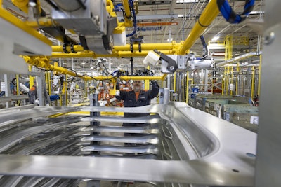 A man works on a truck at Volvo's New River Valley plant.