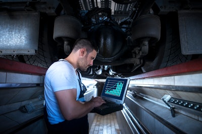 technician in a pit