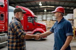 truck drivers shaking hands