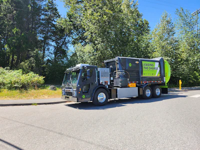 Parked Emterra Environmental Mack LR Electric