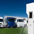 EV trucks parked at charger