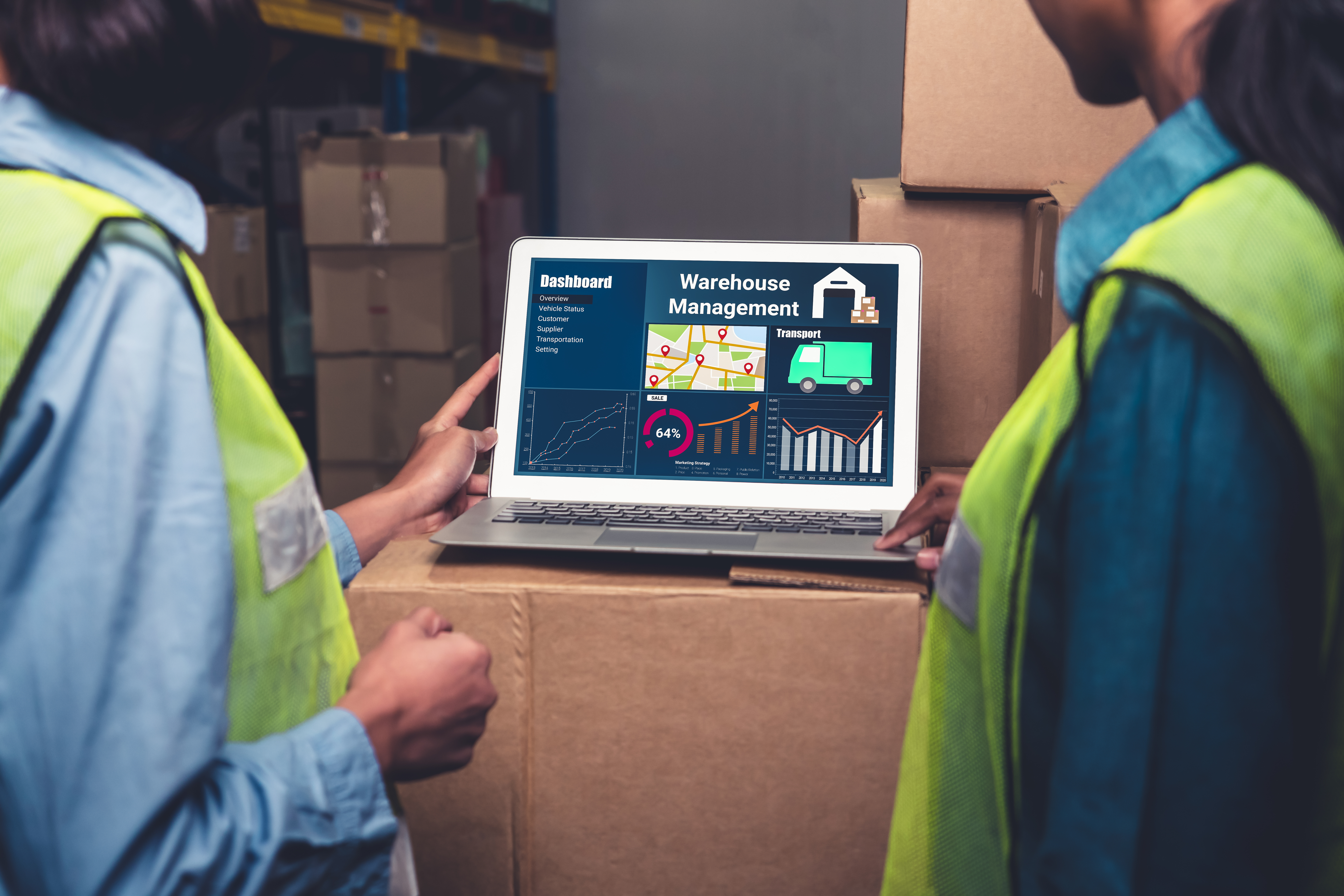 people in a warehouse using a computer