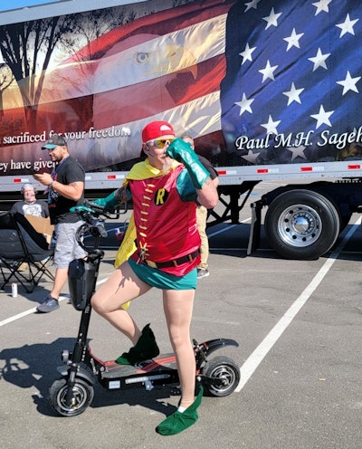 That lead driver, John, turned a joke of Sagehorn's into a bit of downtime fun on the IU tour. Here he's pictured as righthand man to Sagehorn's own Superman, in a Robin costume that others involved on the tour also got in on in other ways.