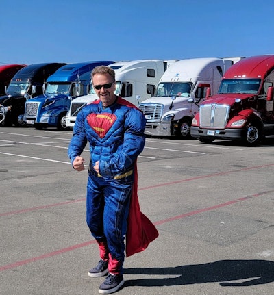 Owner-operator Paul Sagerhorn as Superman, at an Oakland truck stop not long before the IU tour concluded.