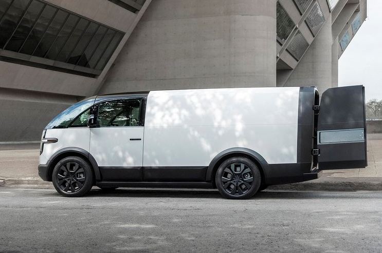 A white Canoo van with the cargo doors open