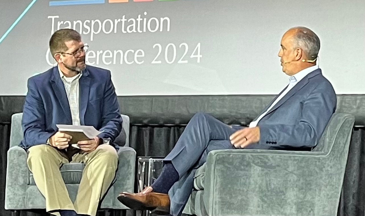 David Carson, senior vice president of sales & marketing at Daimler Truck North America (right) at the FTR Transportation Conference 2024