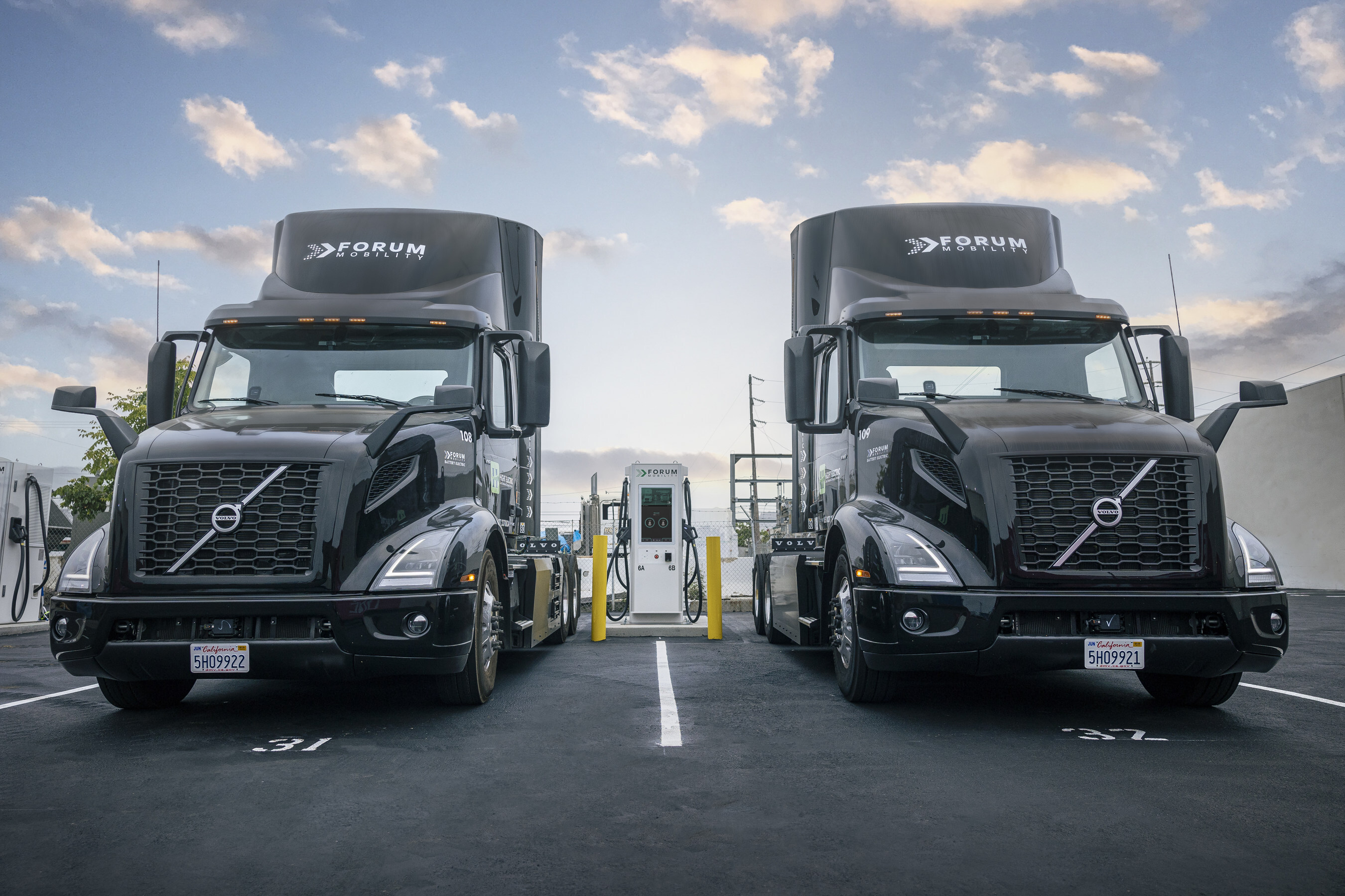 Electric trucks at charger