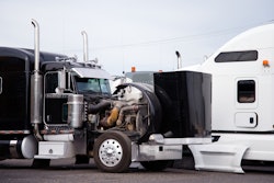 truck broken down with the hood up