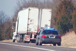 truck pulled over by police at roadside