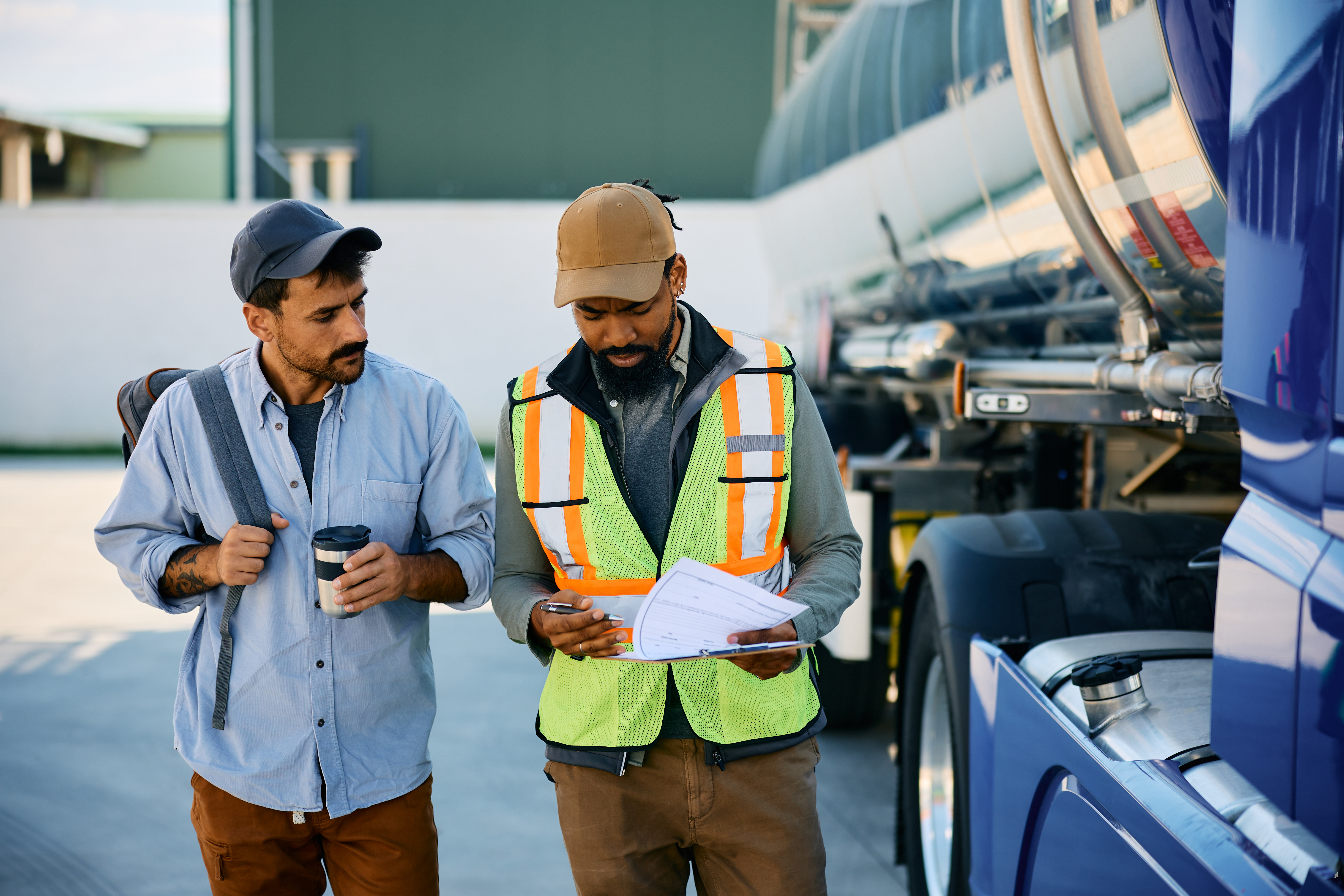 two truck drivers walking
