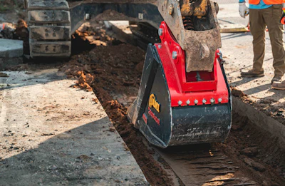 rodradar ground penetrating radar bucket on excavator in shallow dirt trench