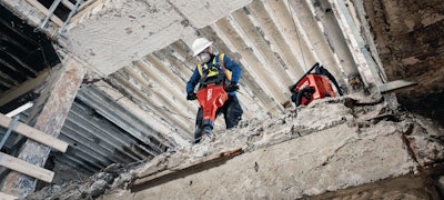 Hilti cordless TE200 Jackhammer breaking concrete on upper floor