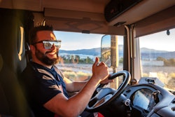 thumbs up truck driver
