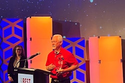 Theron Thompson, an owner-operator with K&J Trucking, accepts the Best Fleet to Drive For award in the small fleet category.