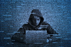 cyber criminal at a computer