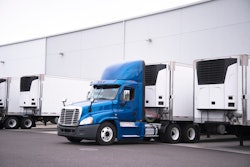 day cab truck backed to dock