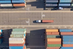 semi truck hauling a container