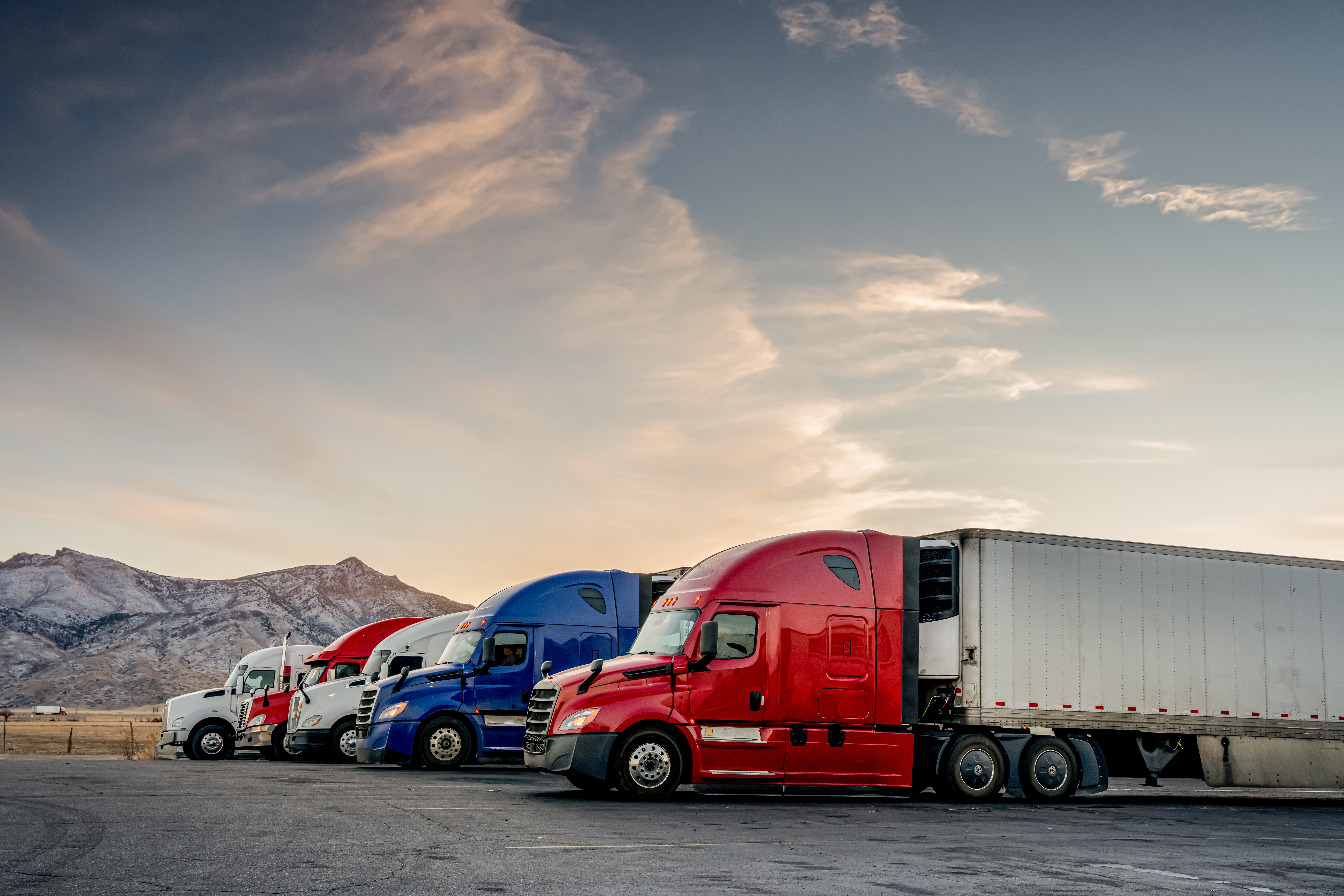 Semi trucks parked outside