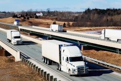 trucks crossing highway bridges