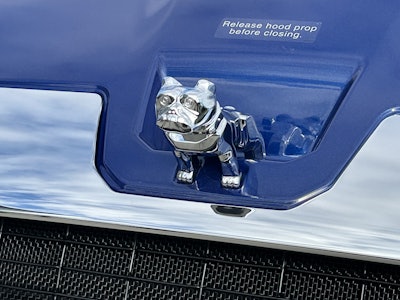 Mack's bulldog has been integrated into the truck’s design, and is flanked by two air intakes that help manage airflow under the hood.