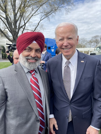 North American Punjabi Trucking Association CEO Raman Dhillon meets with President Joe Biden during the rollout of the Biden-Harris Trucking Action Plan.