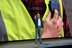 Samsara CEO Sanjit Biswas demonstrates the company's new connected, wearable safety device.