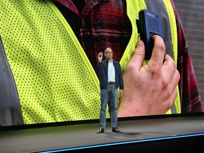 Samsara CEO Sanjit Biswas demonstrates the company's new connected, wearable safety device.