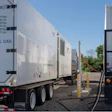 ComTech's compressed natural gas mobile fueler next to trailer