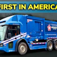 Blue electric garbage truck with Republic Services branding, first in America