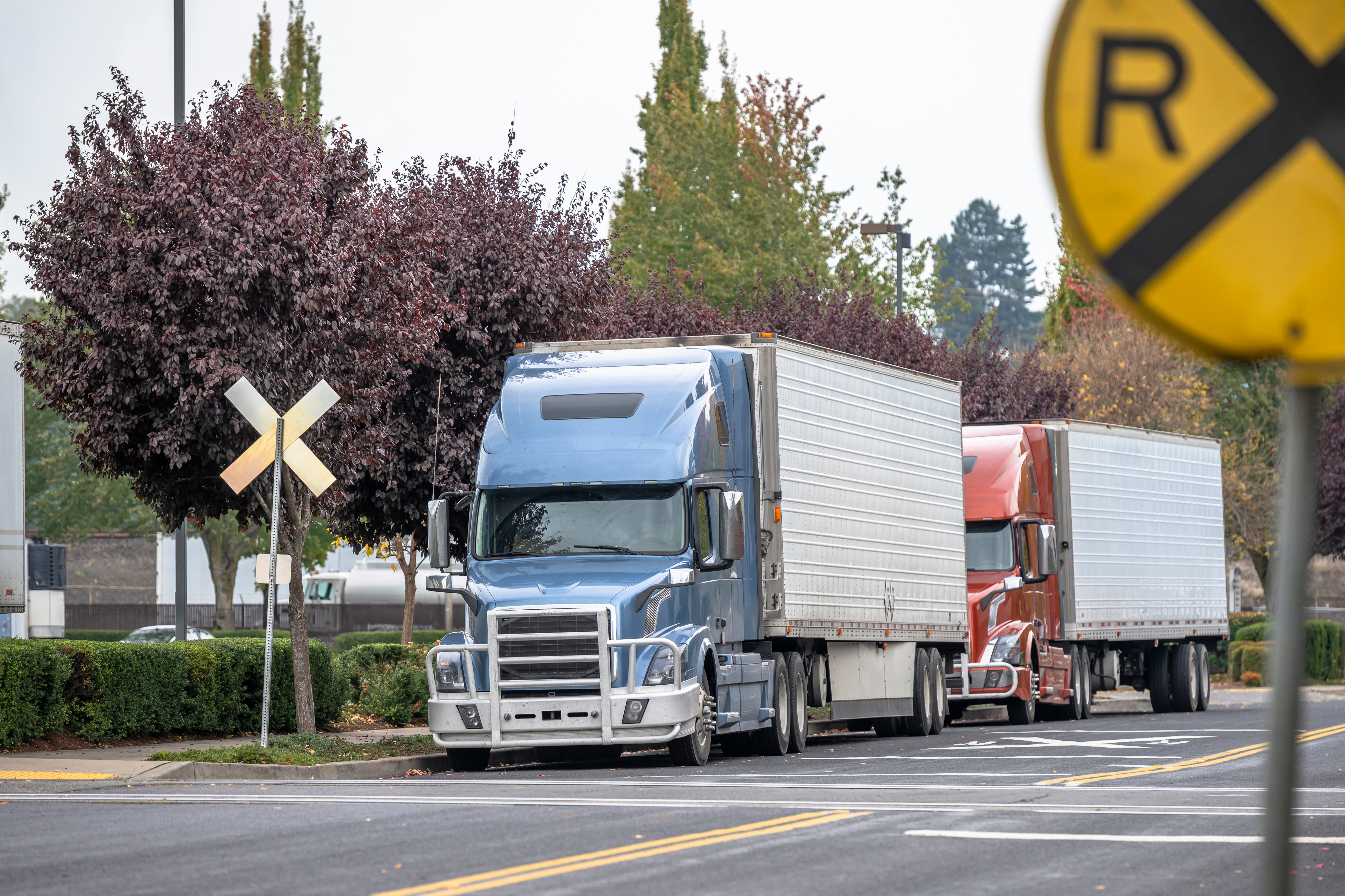 Trucks Railroad Crossing Adobe Stock 299207483