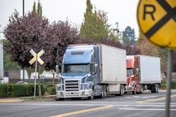 Trucks Railroad Crossing Adobe Stock 299207483