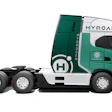 Green and white hydrogen-powered Hyroad semi-truck from side profile