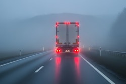 Semi truck with brake lights on