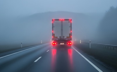 Semi truck with brake lights on
