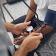 Medical professional measuring blood pressure