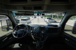 An Aurora autonomous truck self drives among traffic.