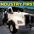 Kenworth T880E semi-truck displayed at ACT 2025