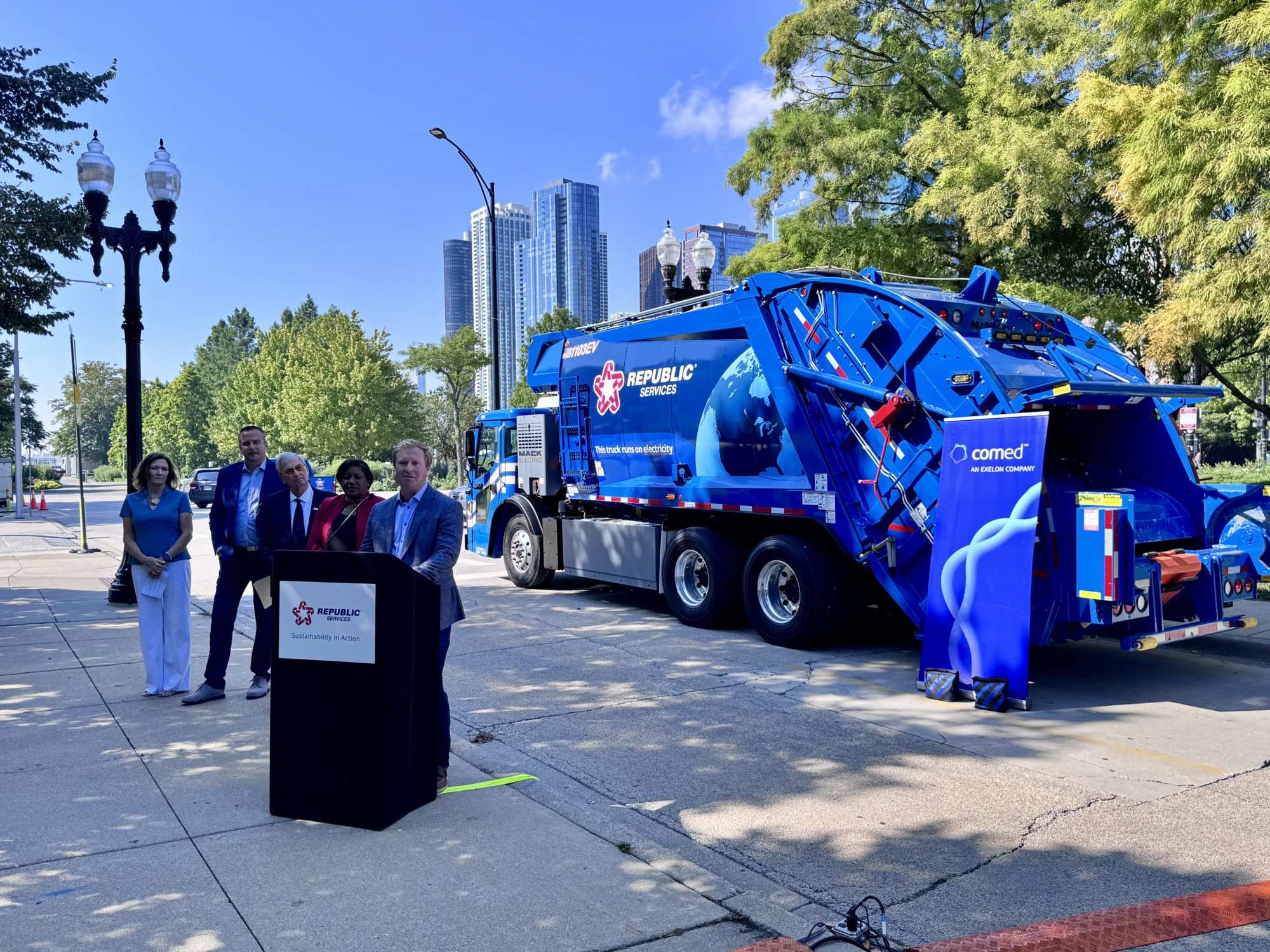 Officials from the city of Chicago and Republic Services inaugurate new Mack LR Electric garbage trucks.