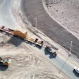 Aerial view of Tesla Giga Nevada taking delivery of stamping press