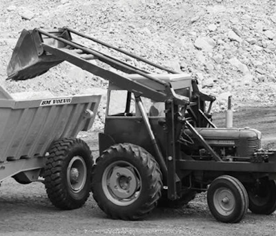 In 1954, Bolinder-Munktell, owned by Volvo, introduced the H-10, an ordinary tractor turned around with the loader bucket over the bigger wheels. Volvo marks it as its first wheel loader, a product that's come a long way and continues to evolve.