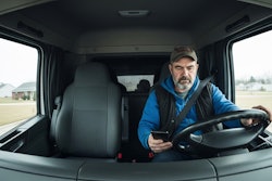 Geotab's GO Focus Plus AI dash camera identifies a truck driver using his smartphone while driving.