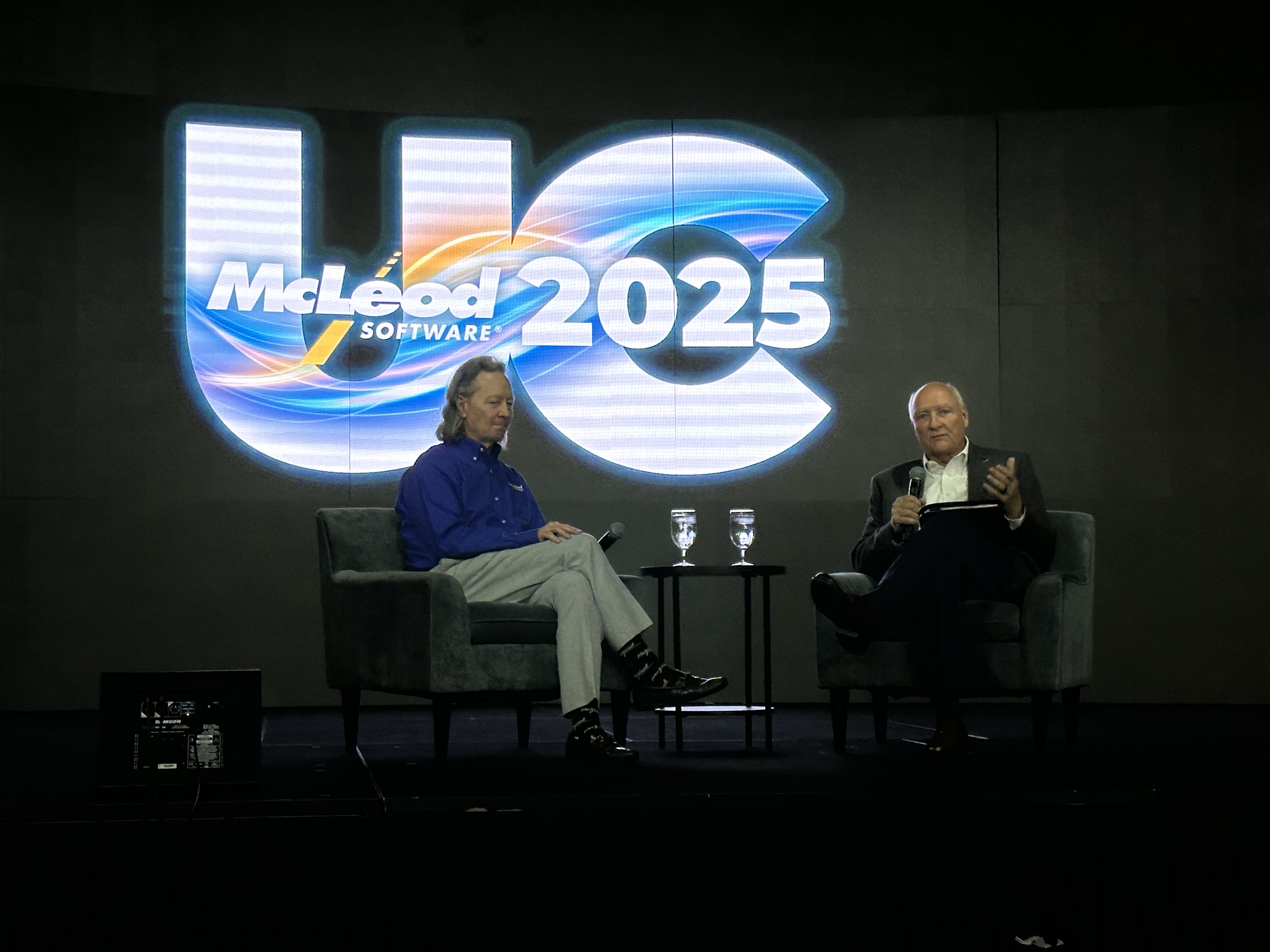 McLeod Software CEO Tom McLeod chats with TCA President Jim Ward at McLeod's annual user conference.