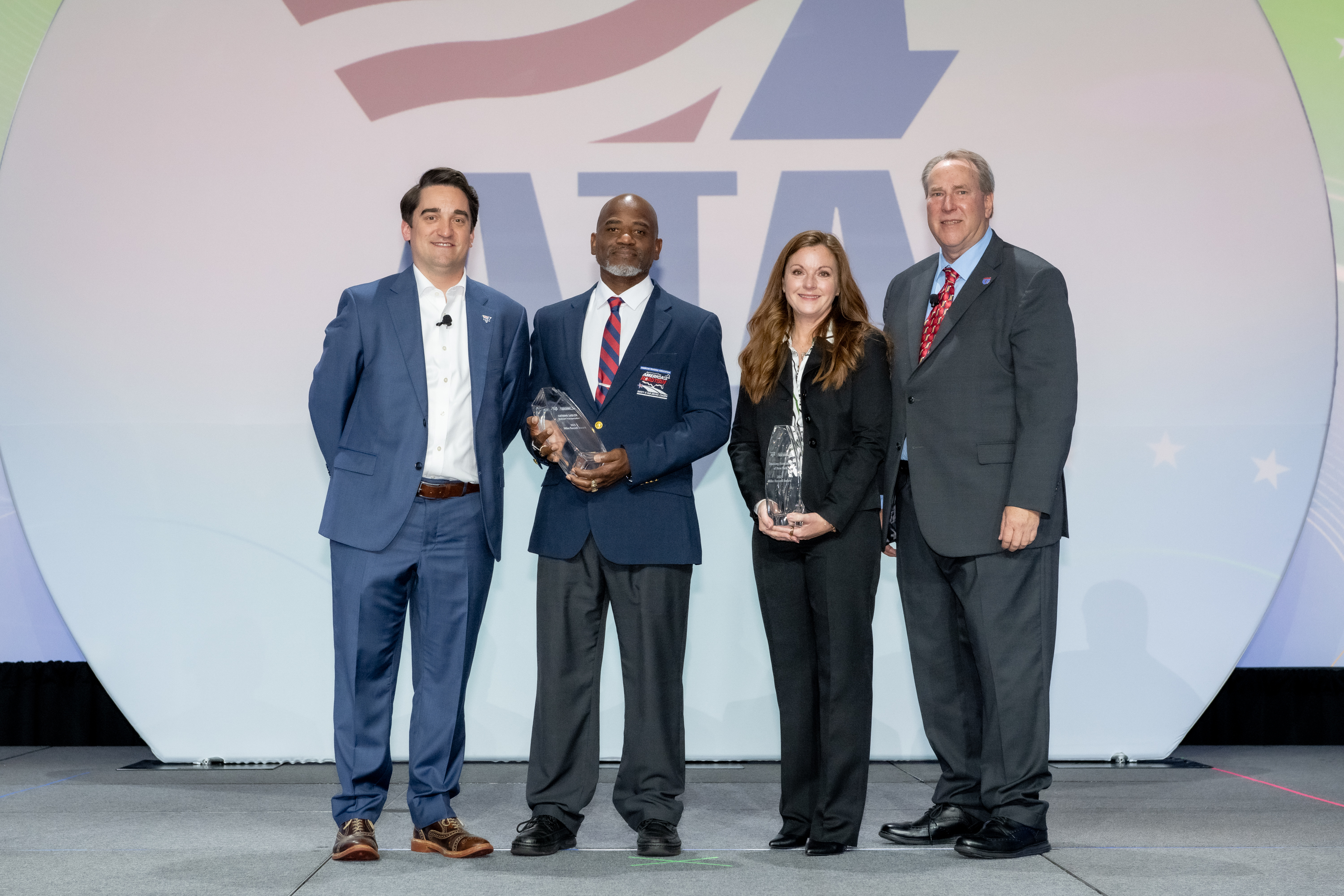 From left: American Trucking Associations COO Dan Horvath, Walmart truck driver Antoine Sadler, TANY President Kendra Hems, and Great West Casualty Senior VP Steve Ponder.