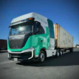 Teal and white Nikola hydrogen-powered semi-truck with cargo trailer