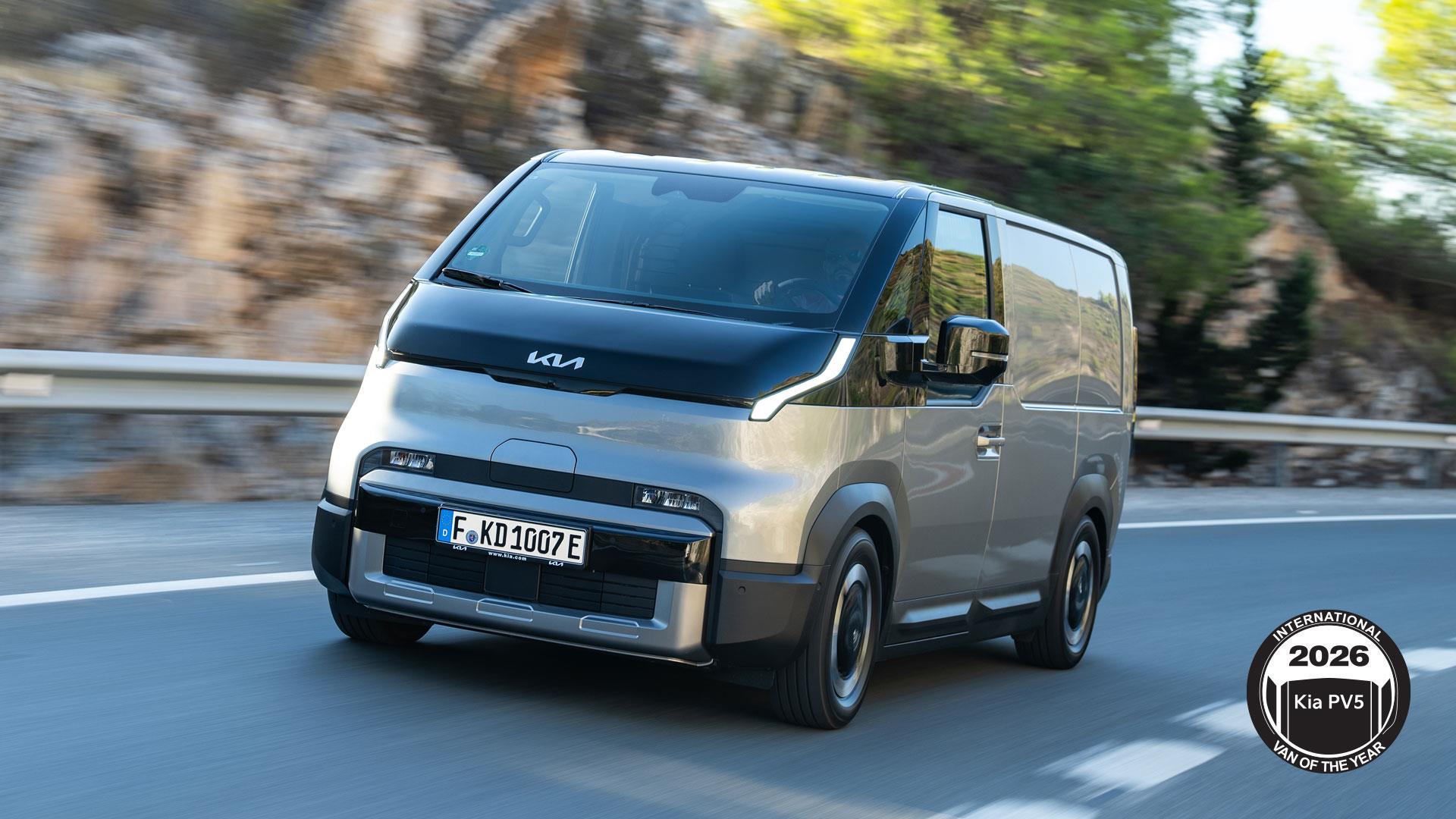 The all-new battery-electric Kia PV5 van driving on a mountain highway.