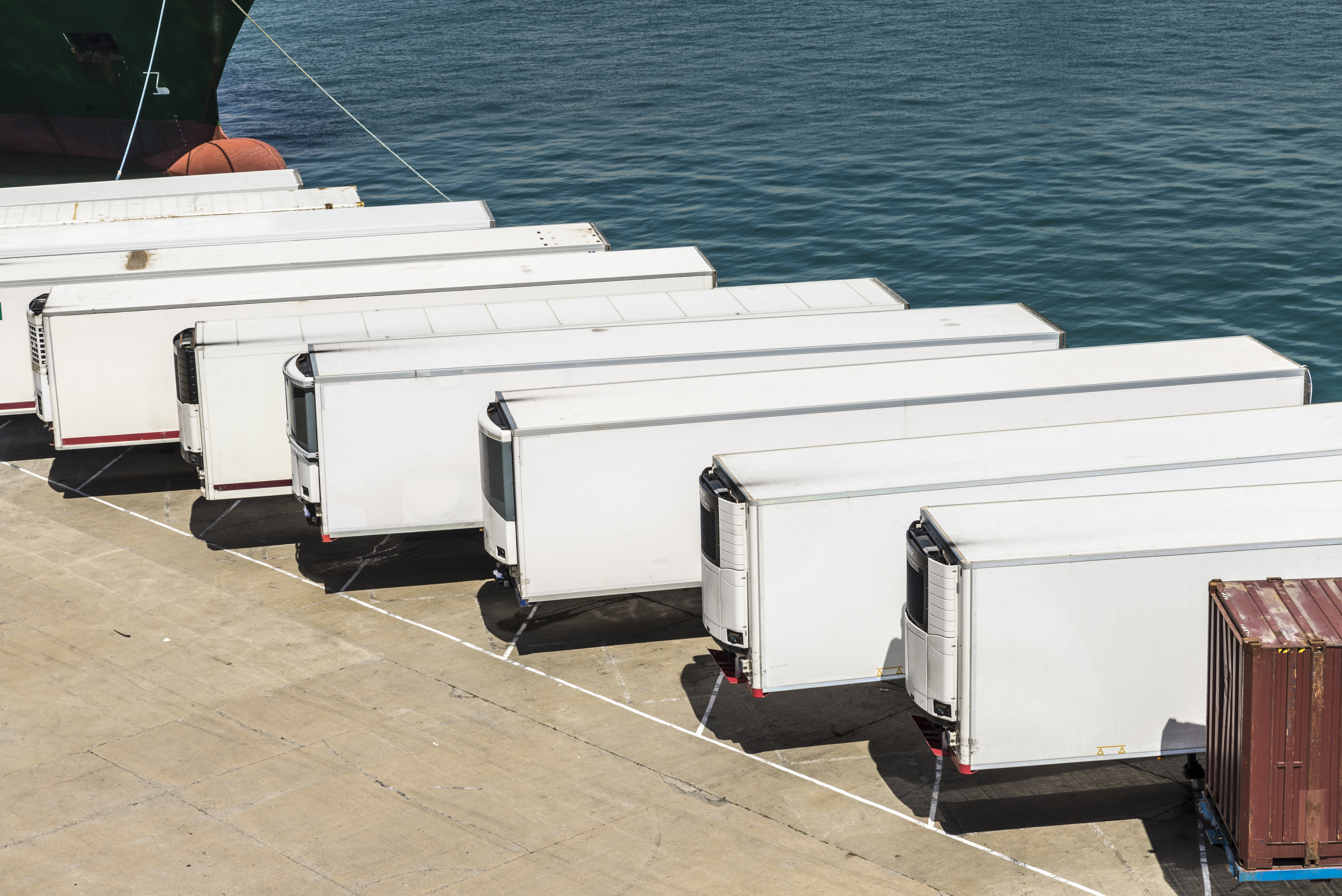 Row Of White Trailers On Pier