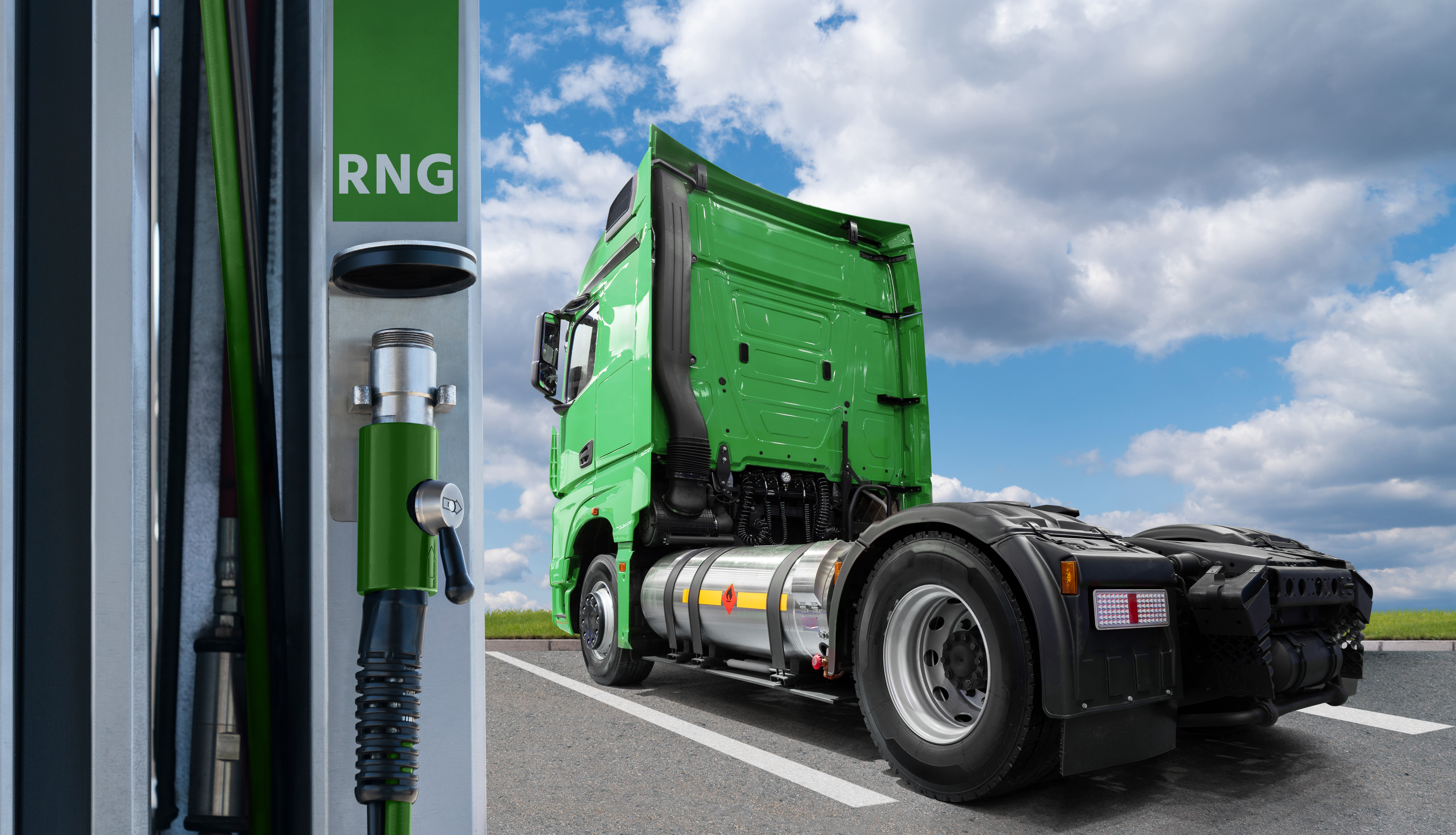 A renewable natural gas (RNG)-powered semi truck parked at a refueling station.