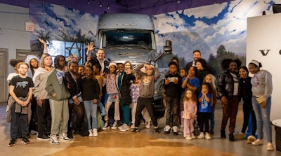 Children, along with VNTNA President Peter Voorhoeve and Joe Rieke, president and CEO of the Miriam P. Brenner Children’s Museum, unveil the All-New Volvo VNL 840 truck exhibit during a ceremony at the museum.