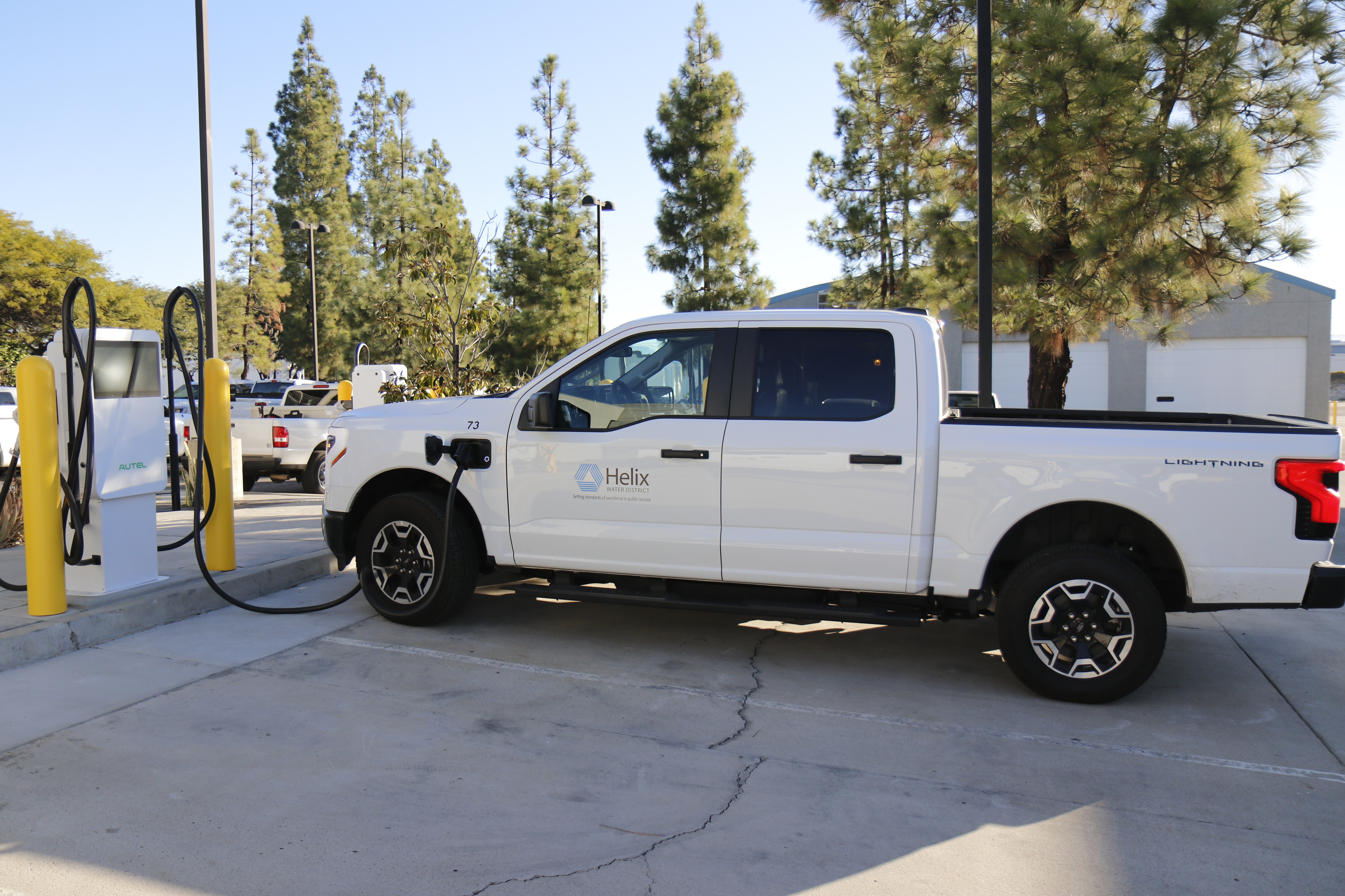 A Ford F-150 Lightning from the Helix Water District charges at the new BetterFleet-powered charging depot in El Cajon, California.