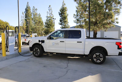 A Ford F-150 Lightning from the Helix Water District charges at the new BetterFleet-powered charging depot in El Cajon, California.